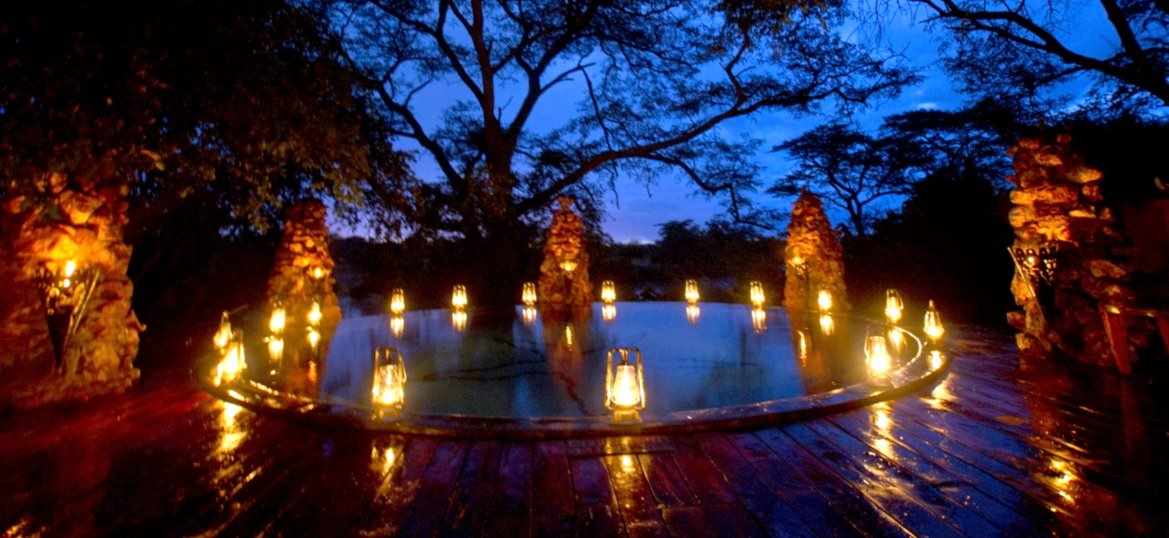 Lanterns around the pool at night